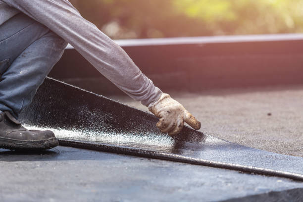 Professional Waterproofing technician working in Worthville, KY